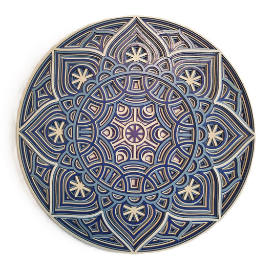 Starwave Mandala ceramic-inspired wood wall art in blue and white with intricate starburst patterns.